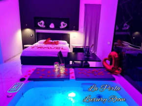 Отель La Perla Luxury Room  Порто-Чезарео